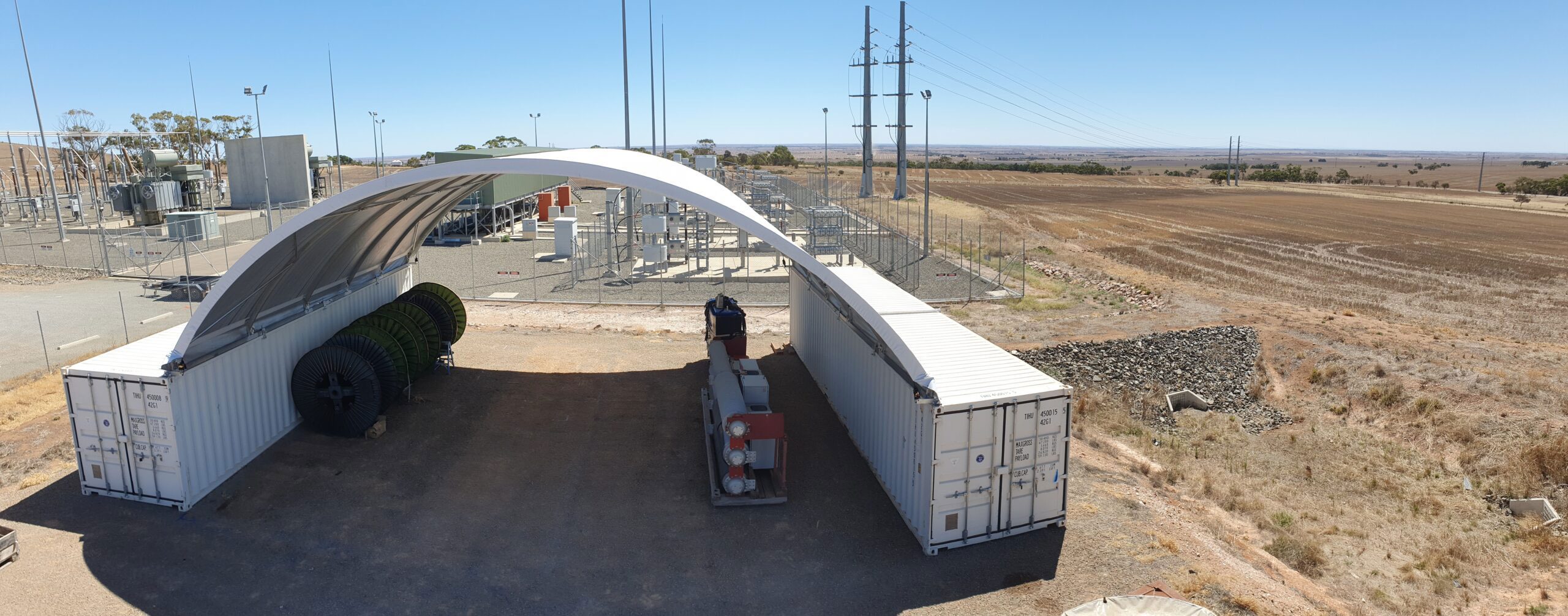 a large white container with a curved roof