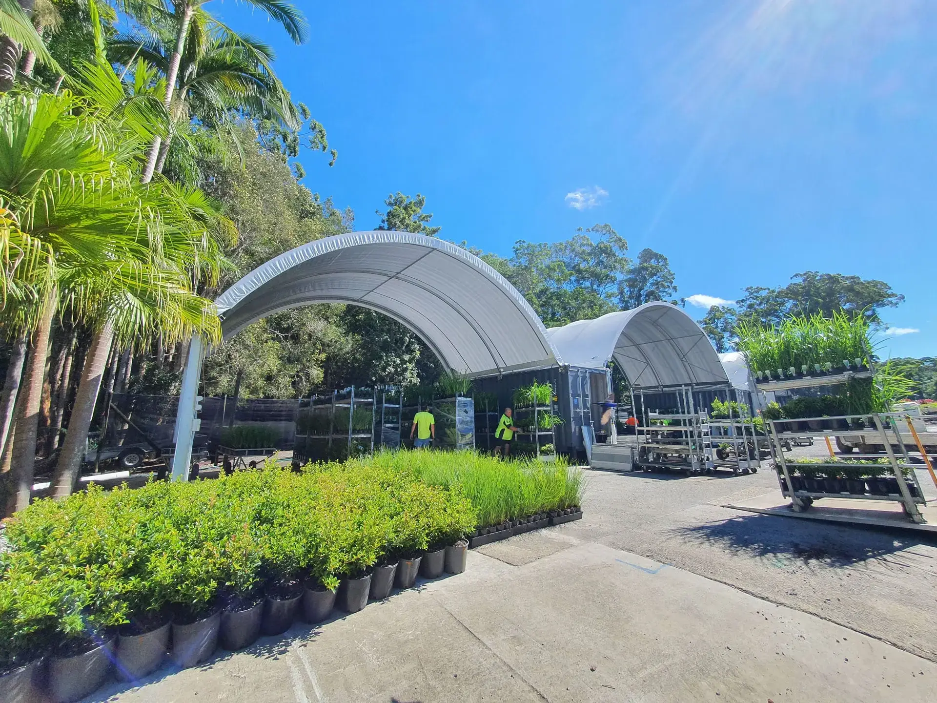 Container dome shelter protecting plants and agricultural equipment outdoors - Ezy Igloo Queensland