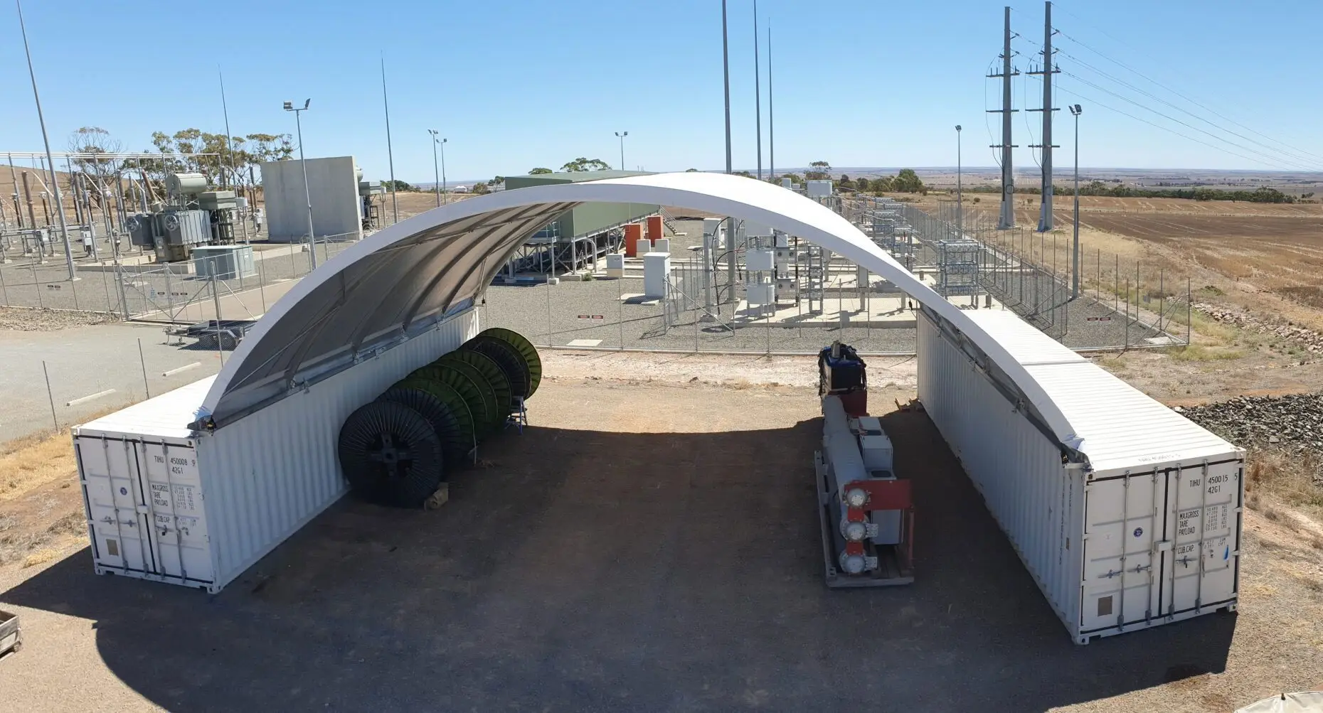 a large white container with a curved roof