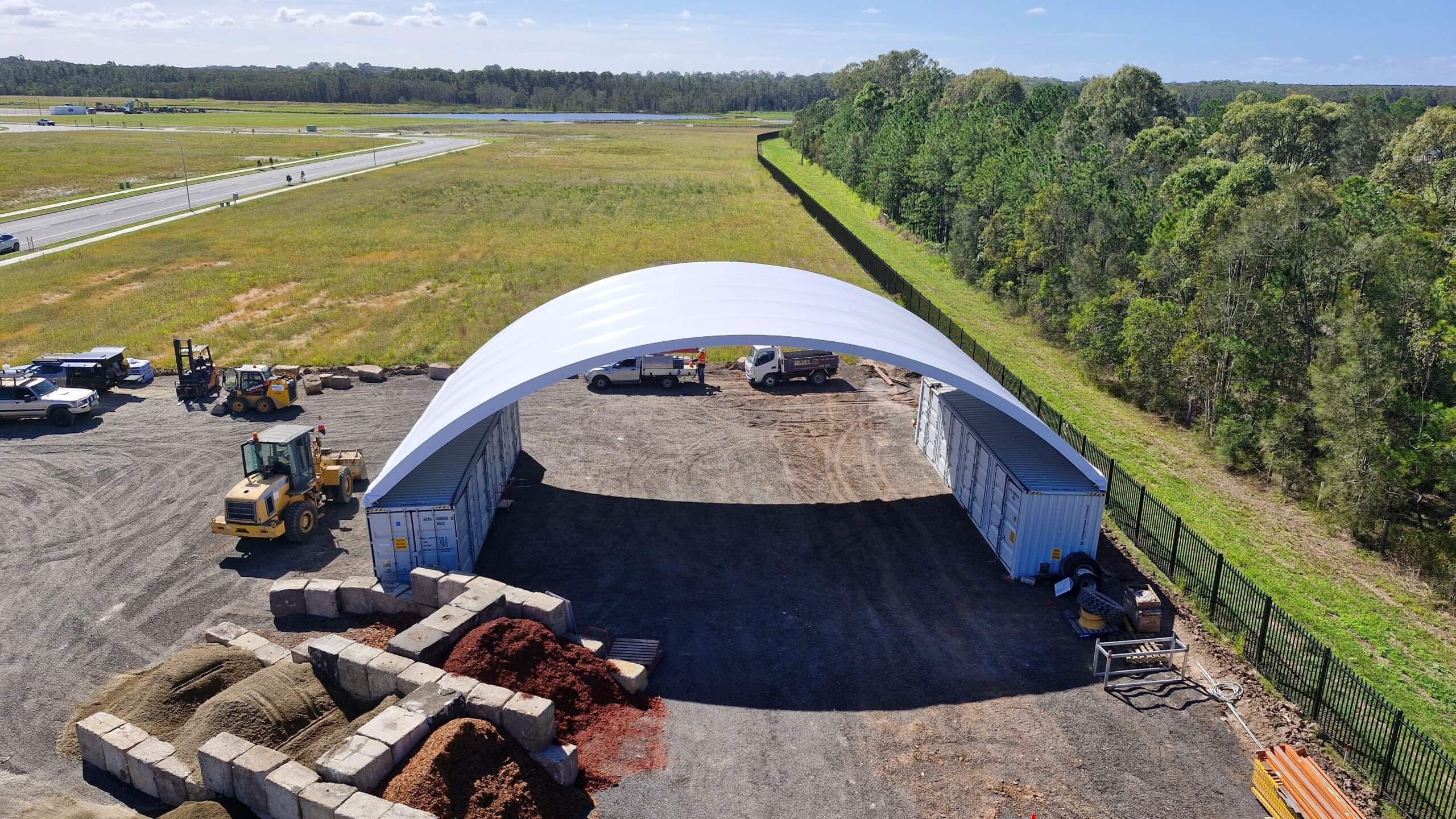 A 21m wide container dome at a worksite.