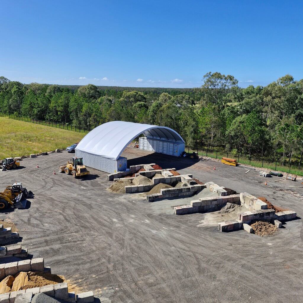 A 21m wide container dome at a worksite.