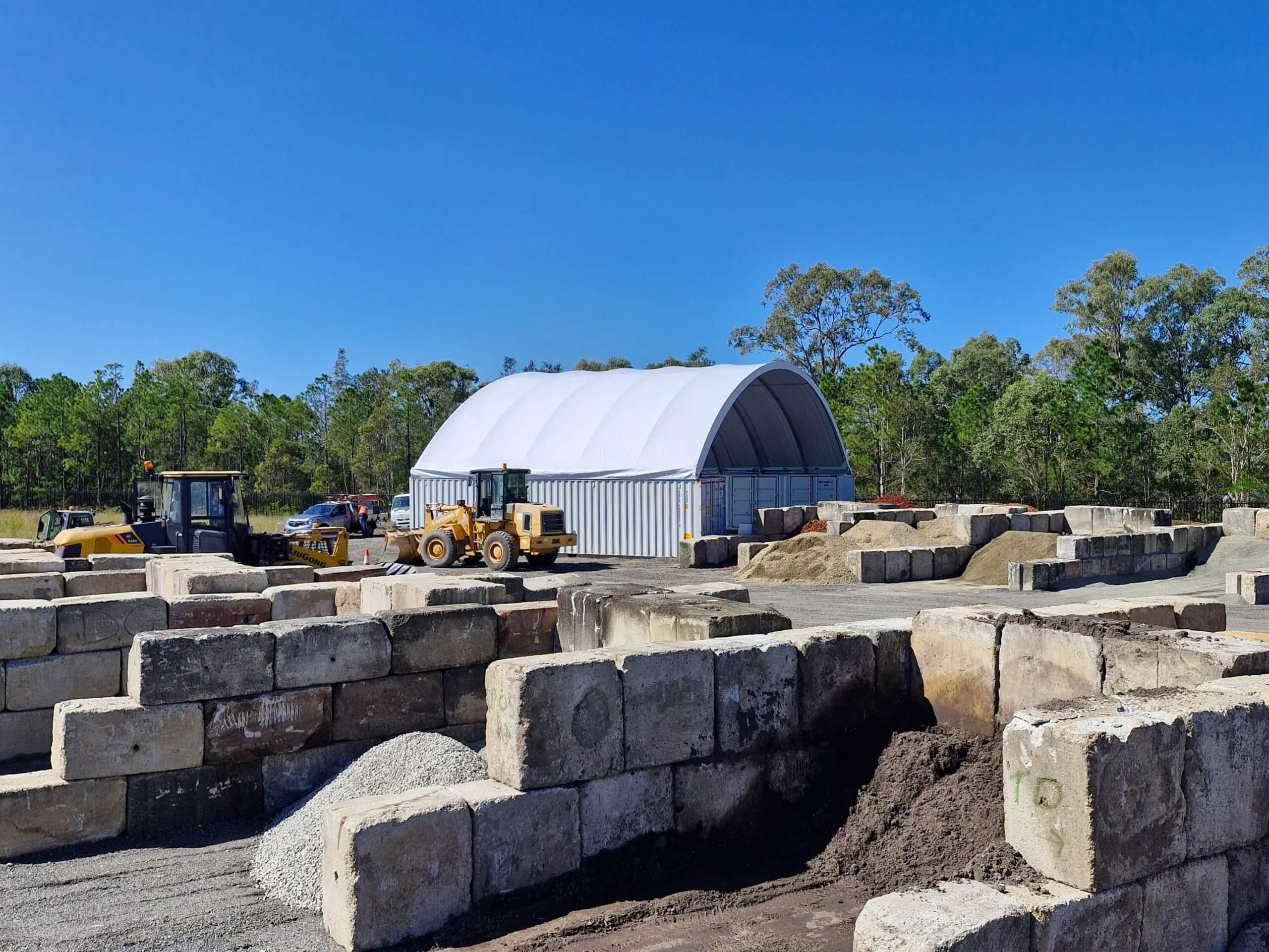 A 21m wide container dome at a worksite.